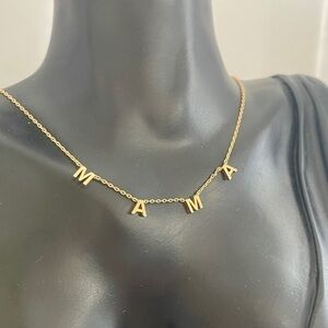 Mama gold tone necklace